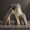Earth Creature sculpture front angle — a creature born from the earth, natural texture meets sculptural art